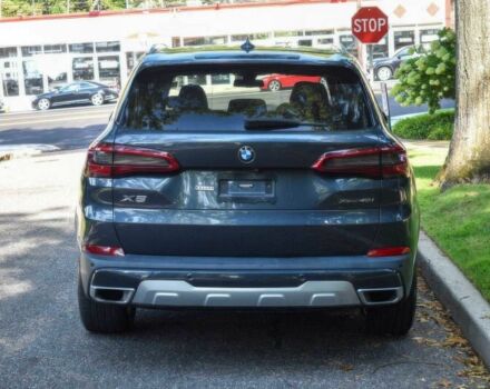 Синий БМВ Х5, объемом двигателя 3 л и пробегом 32 тыс. км за 24300 $, фото 4 на Automoto.ua