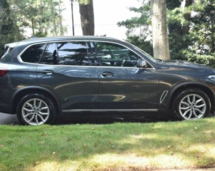 Синий БМВ Х5, объемом двигателя 3 л и пробегом 32 тыс. км за 24300 $, фото 6 на Automoto.ua