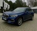 Синий БМВ Х5, объемом двигателя 3 л и пробегом 80 тыс. км за 45000 $, фото 2 на Automoto.ua