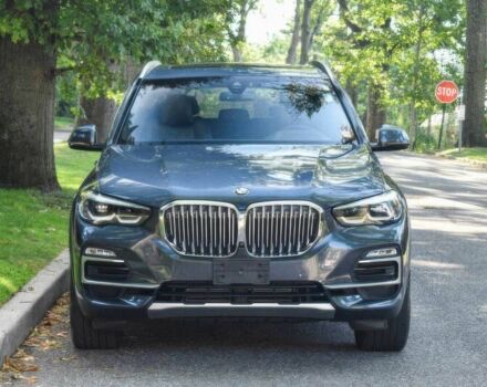 Синий БМВ Х5, объемом двигателя 3 л и пробегом 32 тыс. км за 24300 $, фото 1 на Automoto.ua