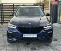 Синий БМВ Х5, объемом двигателя 3 л и пробегом 145 тыс. км за 54900 $, фото 1 на Automoto.ua