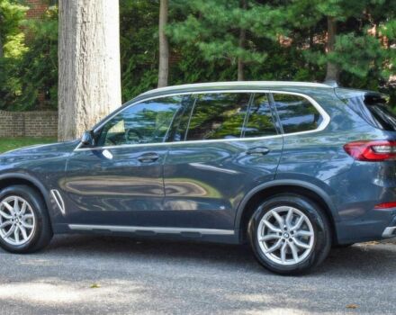 Синий БМВ Х5, объемом двигателя 3 л и пробегом 32 тыс. км за 24300 $, фото 3 на Automoto.ua