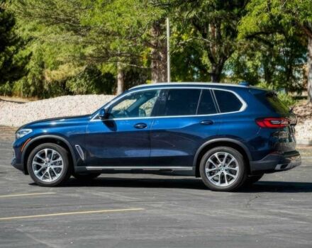 Синий БМВ Х5, объемом двигателя 3 л и пробегом 32 тыс. км за 19700 $, фото 4 на Automoto.ua