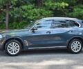 Синий БМВ Х5, объемом двигателя 3 л и пробегом 32 тыс. км за 24300 $, фото 2 на Automoto.ua