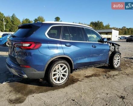 Синий БМВ Х5, объемом двигателя 3 л и пробегом 49 тыс. км за 19500 $, фото 2 на Automoto.ua