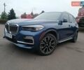 Синий БМВ Х5, объемом двигателя 3 л и пробегом 83 тыс. км за 49900 $, фото 1 на Automoto.ua