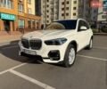 Синій БМВ Х5, об'ємом двигуна 3 л та пробігом 104 тис. км за 42000 $, фото 1 на Automoto.ua