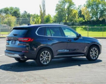 Синий БМВ Х5, объемом двигателя 3 л и пробегом 32 тыс. км за 19700 $, фото 5 на Automoto.ua