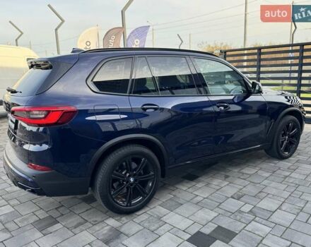 Синий БМВ Х5, объемом двигателя 3 л и пробегом 145 тыс. км за 54900 $, фото 2 на Automoto.ua