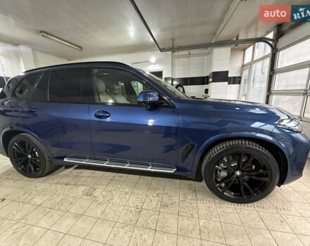 Синий БМВ Х5, объемом двигателя 3 л и пробегом 82 тыс. км за 59100 $, фото 4 на Automoto.ua