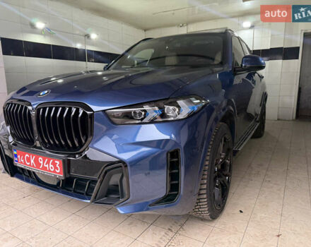 Синий БМВ Х5, объемом двигателя 3 л и пробегом 82 тыс. км за 59100 $, фото 2 на Automoto.ua