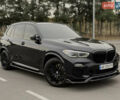 Синий БМВ Х5, объемом двигателя 3 л и пробегом 105 тыс. км за 59500 $, фото 1 на Automoto.ua