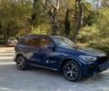 Синий БМВ Х5, объемом двигателя 3 л и пробегом 56 тыс. км за 32100 $, фото 1 на Automoto.ua