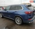 Синий БМВ Х5, объемом двигателя 3 л и пробегом 138 тыс. км за 24300 $, фото 1 на Automoto.ua