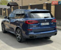 Синий БМВ Х5, объемом двигателя 3 л и пробегом 82 тыс. км за 74500 $, фото 1 на Automoto.ua