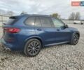 Синий БМВ Х5, объемом двигателя 3 л и пробегом 29 тыс. км за 22000 $, фото 2 на Automoto.ua