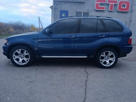 Синий БМВ Х5, объемом двигателя 3 л и пробегом 380 тыс. км за 6700 $, фото 1 на Automoto.ua