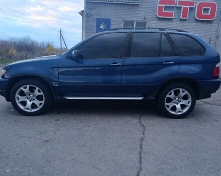 Синий БМВ Х5, объемом двигателя 3 л и пробегом 380 тыс. км за 6700 $, фото 1 на Automoto.ua