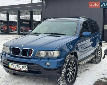 Синий БМВ Х5, объемом двигателя 3 л и пробегом 314 тыс. км за 7000 $, фото 1 на Automoto.ua