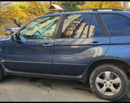 Синий БМВ Х5, объемом двигателя 3 л и пробегом 560 тыс. км за 9500 $, фото 1 на Automoto.ua