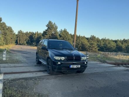 Синий БМВ Х5, объемом двигателя 3 л и пробегом 420 тыс. км за 5450 $, фото 1 на Automoto.ua