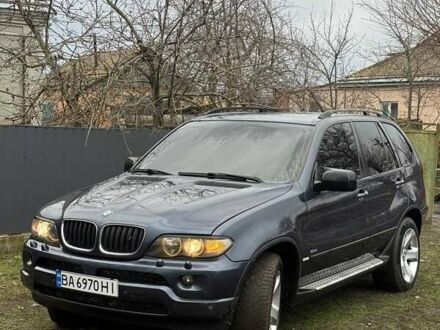 Синий БМВ Х5, объемом двигателя 2.99 л и пробегом 398 тыс. км за 8999 $, фото 1 на Automoto.ua