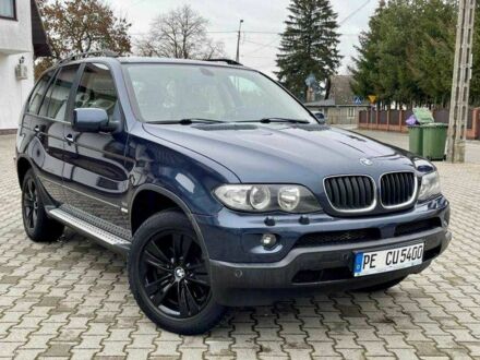 Синій БМВ Х5, об'ємом двигуна 3 л та пробігом 275 тис. км за 3023 $, фото 1 на Automoto.ua