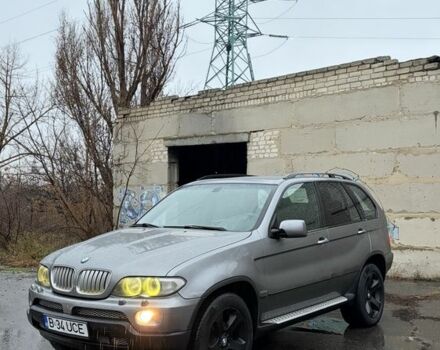 Синий БМВ Х5, объемом двигателя 3 л и пробегом 300 тыс. км за 6200 $, фото 1 на Automoto.ua