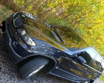Синий БМВ Х5, объемом двигателя 3 л и пробегом 309 тыс. км за 7062 $, фото 1 на Automoto.ua