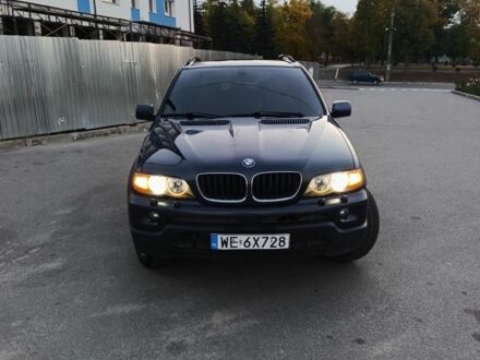 Синий БМВ Х5, объемом двигателя 3 л и пробегом 300 тыс. км за 5400 $, фото 1 на Automoto.ua
