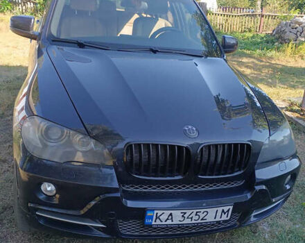 Синий БМВ Х5, объемом двигателя 3 л и пробегом 264 тыс. км за 10000 $, фото 1 на Automoto.ua