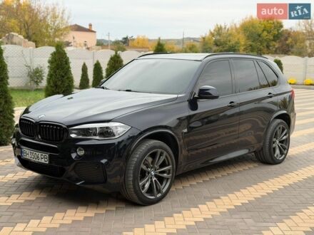 Синий БМВ Х5, объемом двигателя 3 л и пробегом 175 тыс. км за 25000 $, фото 1 на Automoto.ua
