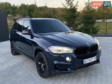 Синий БМВ Х5, объемом двигателя 3 л и пробегом 305 тыс. км за 20650 $, фото 1 на Automoto.ua