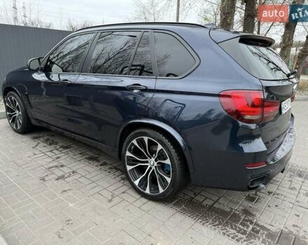 Синій БМВ Х5, об'ємом двигуна 3 л та пробігом 300 тис. км за 28700 $, фото 1 на Automoto.ua