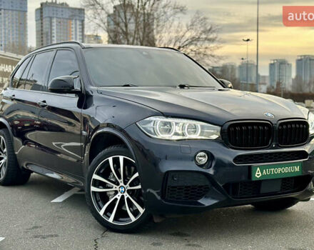 Синий БМВ Х5, объемом двигателя 4.4 л и пробегом 143 тыс. км за 33999 $, фото 1 на Automoto.ua