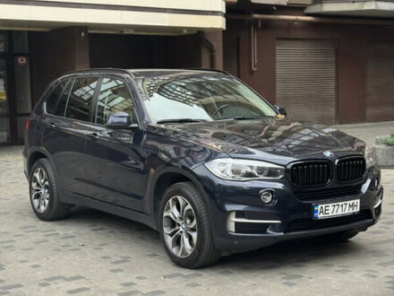 Синій БМВ Х5, об'ємом двигуна 2 л та пробігом 100 тис. км за 29999 $, фото 1 на Automoto.ua