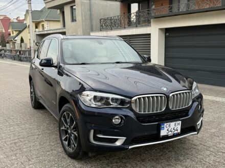 Синій БМВ Х5, об'ємом двигуна 3 л та пробігом 128 тис. км за 27000 $, фото 1 на Automoto.ua