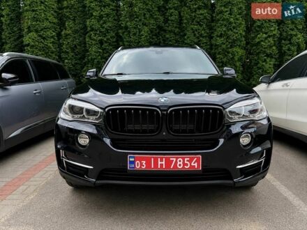 Синій БМВ Х5, об'ємом двигуна 2 л та пробігом 128 тис. км за 31500 $, фото 1 на Automoto.ua