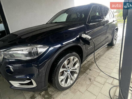 Синий БМВ Х5, объемом двигателя 2 л и пробегом 235 тыс. км за 27900 $, фото 1 на Automoto.ua