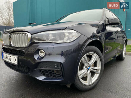 Синій БМВ Х5, об'ємом двигуна 2 л та пробігом 170 тис. км за 24500 $, фото 1 на Automoto.ua