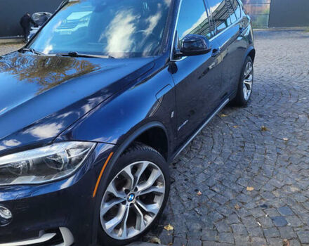 Синий БМВ Х5, объемом двигателя 2 л и пробегом 250 тыс. км за 25999 $, фото 1 на Automoto.ua