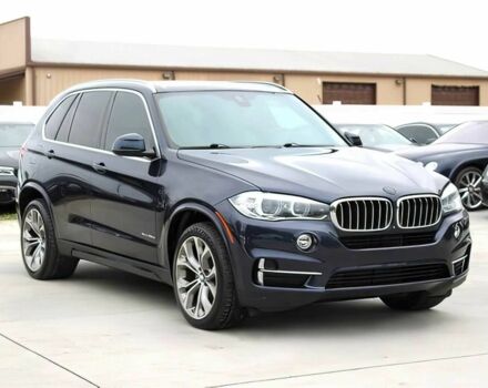 Синий БМВ Х5, объемом двигателя 3 л и пробегом 58 тыс. км за 17300 $, фото 1 на Automoto.ua