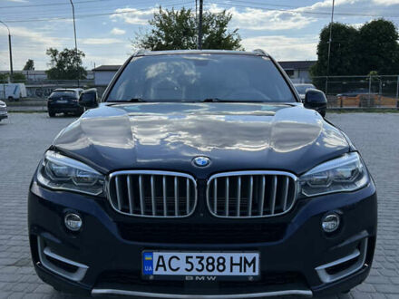 Синий БМВ Х5, объемом двигателя 2 л и пробегом 205 тыс. км за 34000 $, фото 1 на Automoto.ua