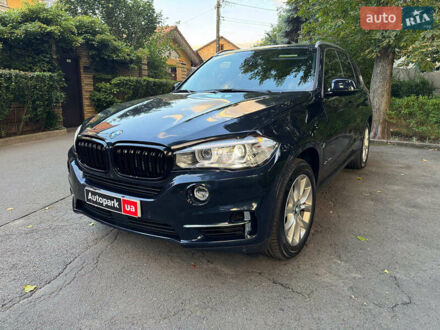 Синій БМВ Х5, об'ємом двигуна 2 л та пробігом 71 тис. км за 37440 $, фото 1 на Automoto.ua