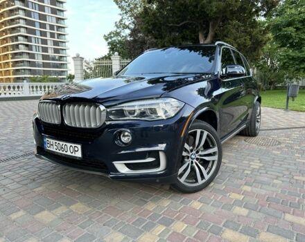 Синий БМВ Х5, объемом двигателя 3 л и пробегом 74 тыс. км за 31500 $, фото 1 на Automoto.ua