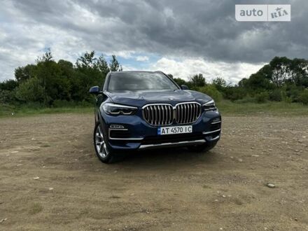 Синий БМВ Х5, объемом двигателя 3 л и пробегом 71 тыс. км за 54800 $, фото 1 на Automoto.ua