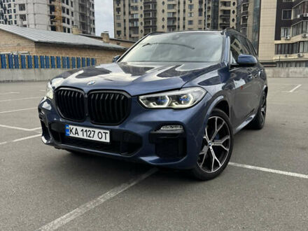 Синий БМВ Х5, объемом двигателя 3 л и пробегом 83 тыс. км за 57500 $, фото 1 на Automoto.ua