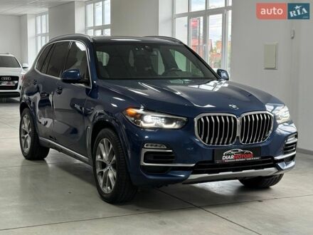 Синий БМВ Х5, объемом двигателя 3 л и пробегом 142 тыс. км за 40500 $, фото 1 на Automoto.ua