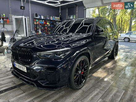 Синий БМВ Х5, объемом двигателя 3 л и пробегом 97 тыс. км за 51000 $, фото 1 на Automoto.ua