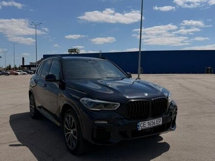 Синий БМВ Х5, объемом двигателя 3 л и пробегом 73 тыс. км за 49500 $, фото 1 на Automoto.ua